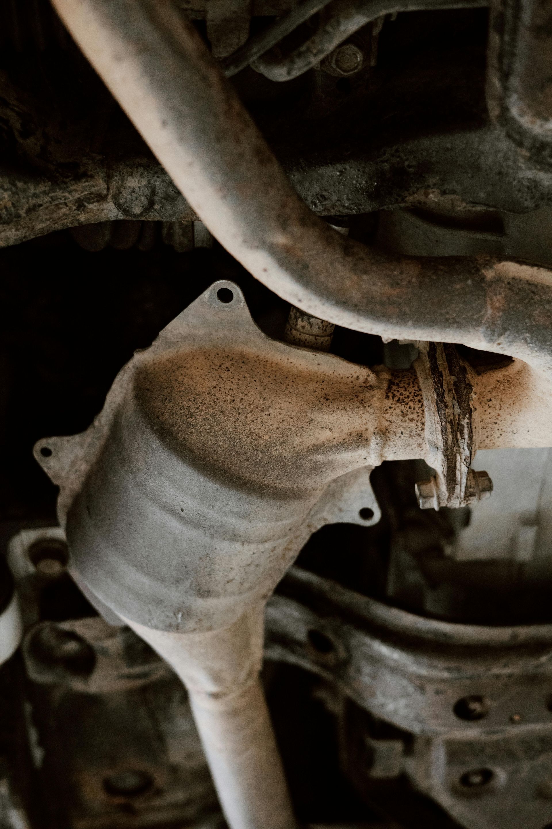 A close up of a exhaust pipe on a car.
