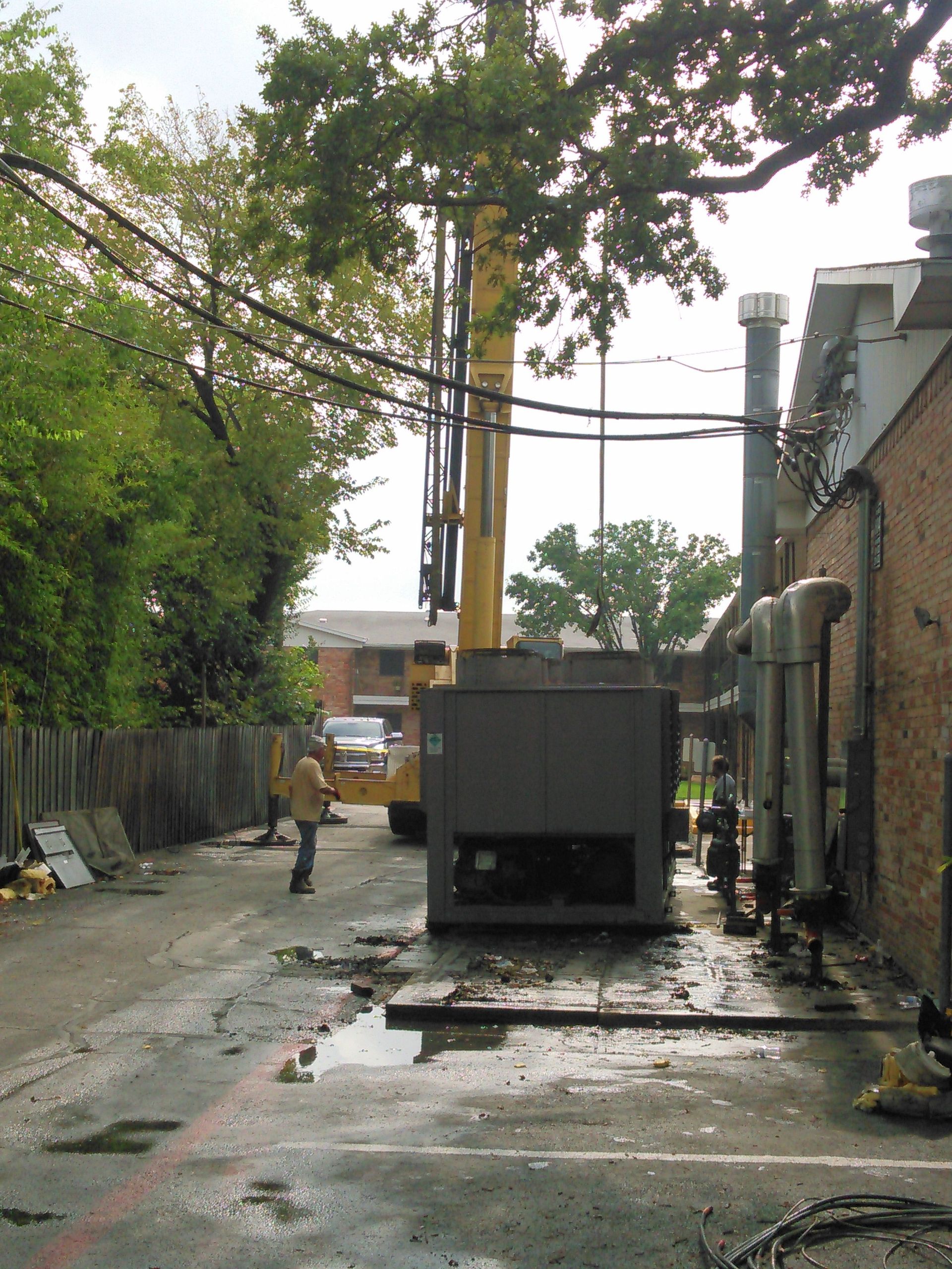 HVAC unit installed by Tom's Commercial outside of Edgewood Apartments