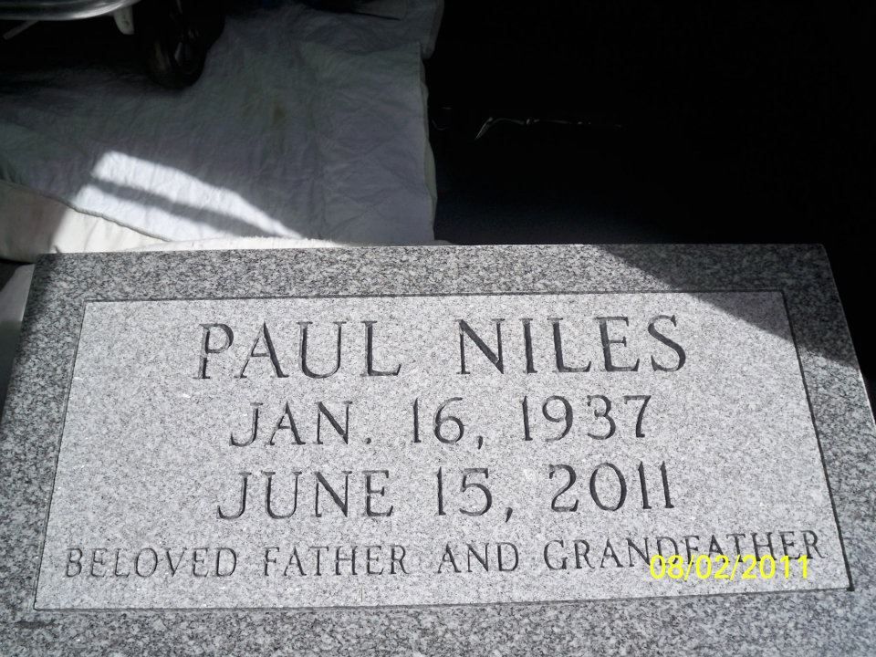 Gravestone of Paul Niles with birth and death dates, noting him as 