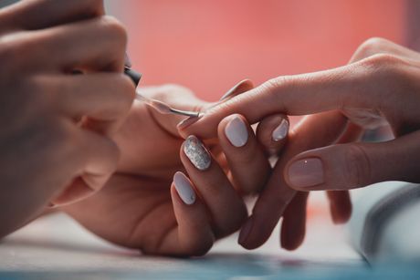 Manicurist Applying Nail Polish — Cheshire, CT — ManiPedi Come 2 U