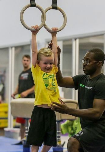 boy doing gymnastics