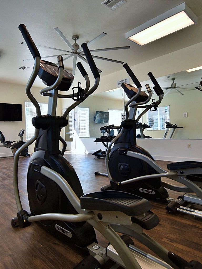 there is a pool table in the middle of the room .