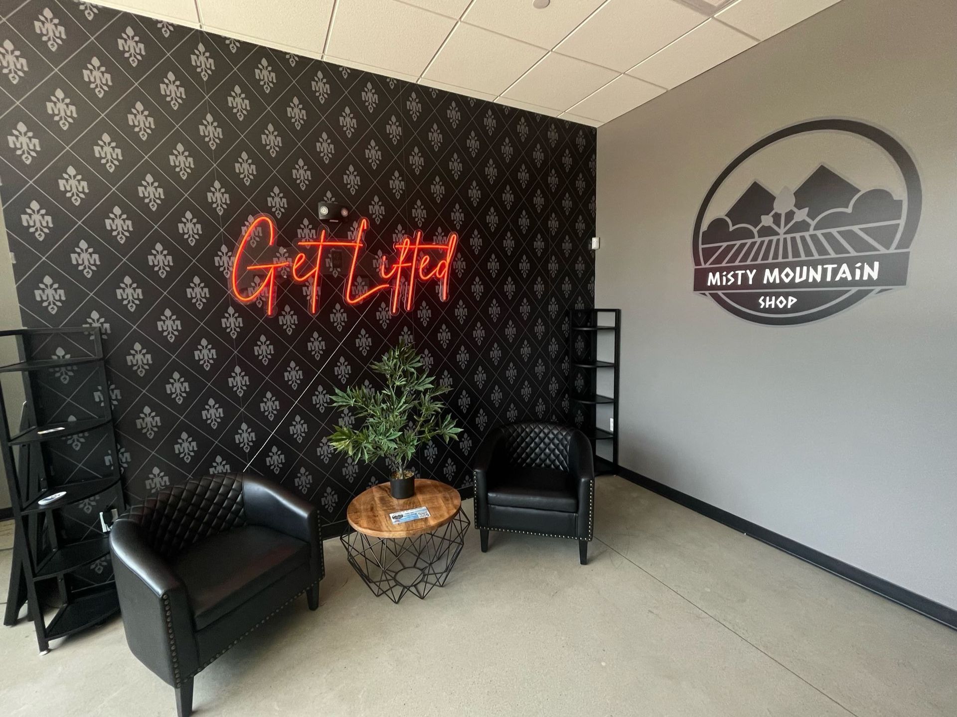 A room with two chairs and a sign that says get lucky