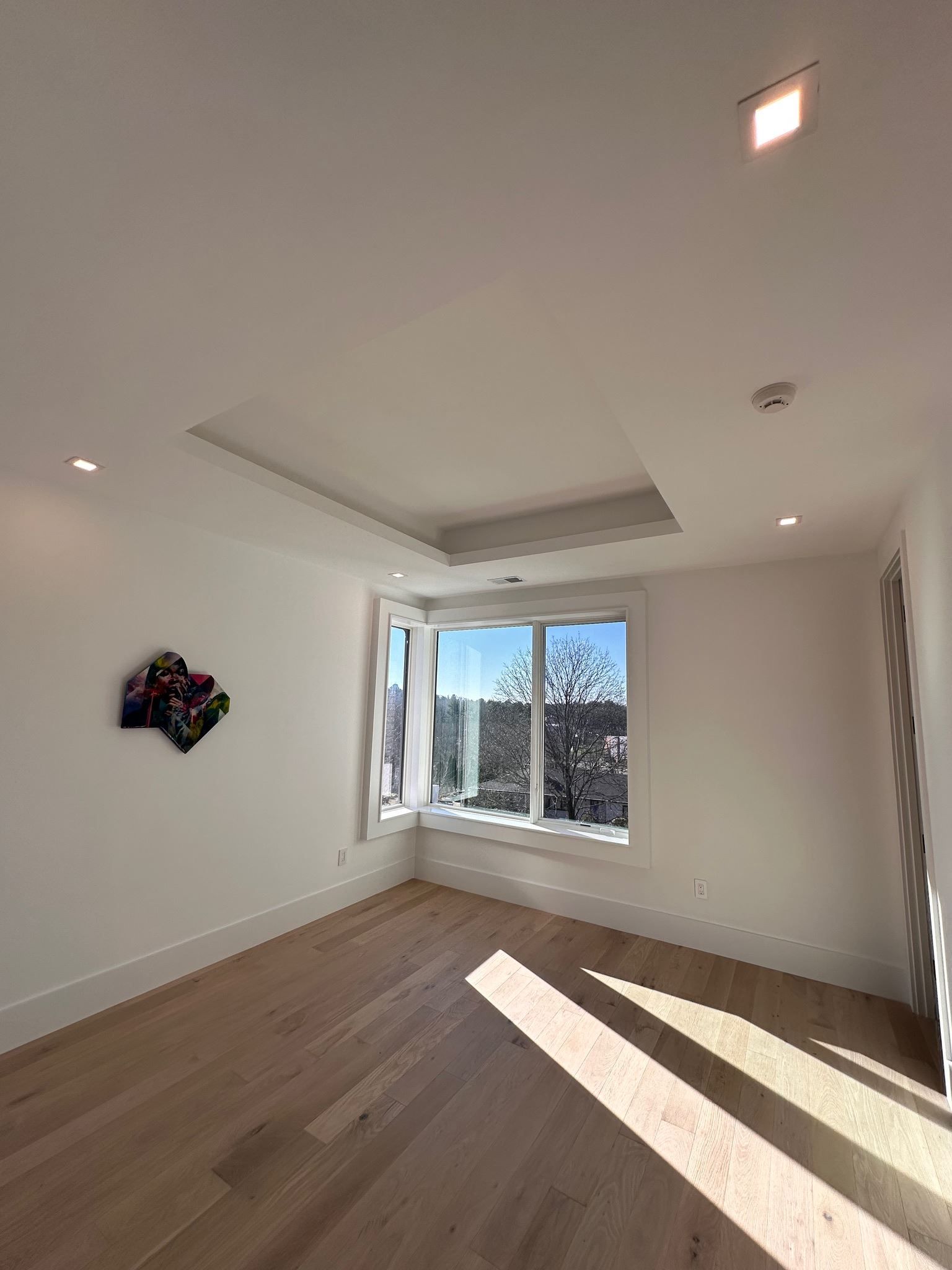 There is a large window in the middle of the room.