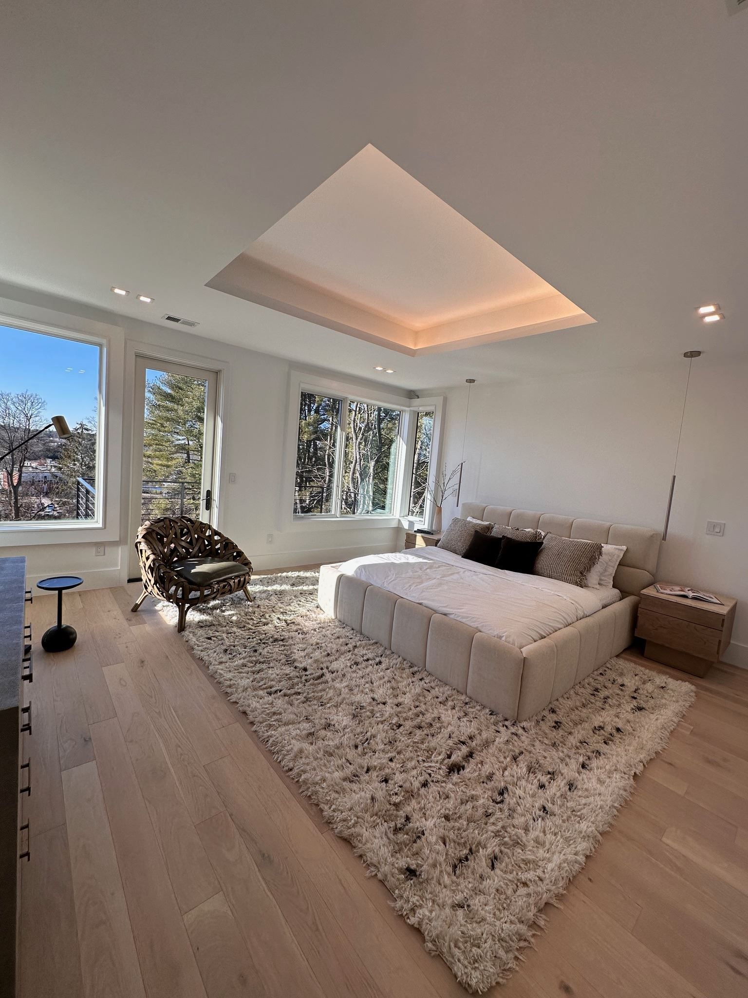 There is a large bed in the middle of the room.