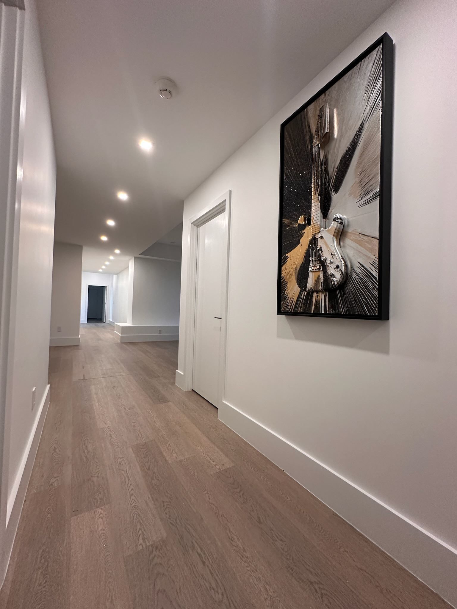 A long hallway with a picture of michael jordan on the wall