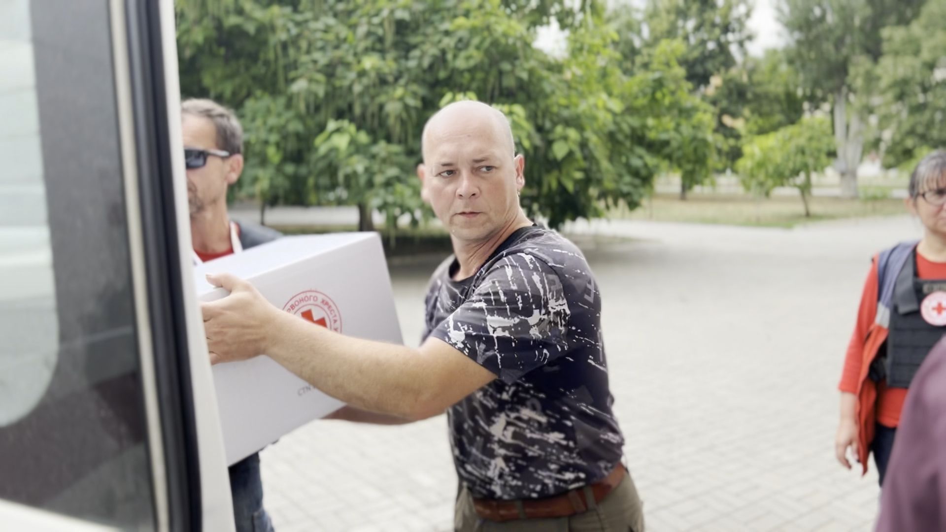 A still image from People of War , the new documentary tells the story of volunteers at Ukraine's frontline who rescue residents, deliver food and risk their lives to ease civilian suffering. 