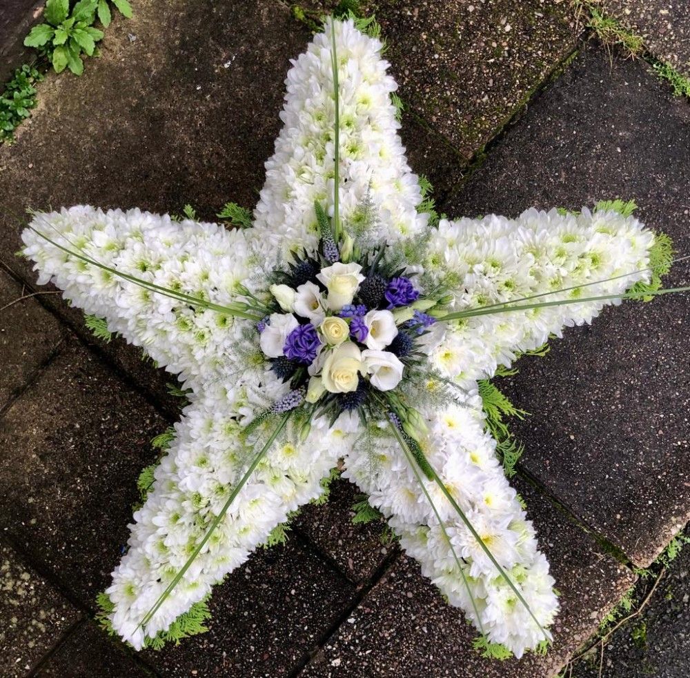 star funeral flowers