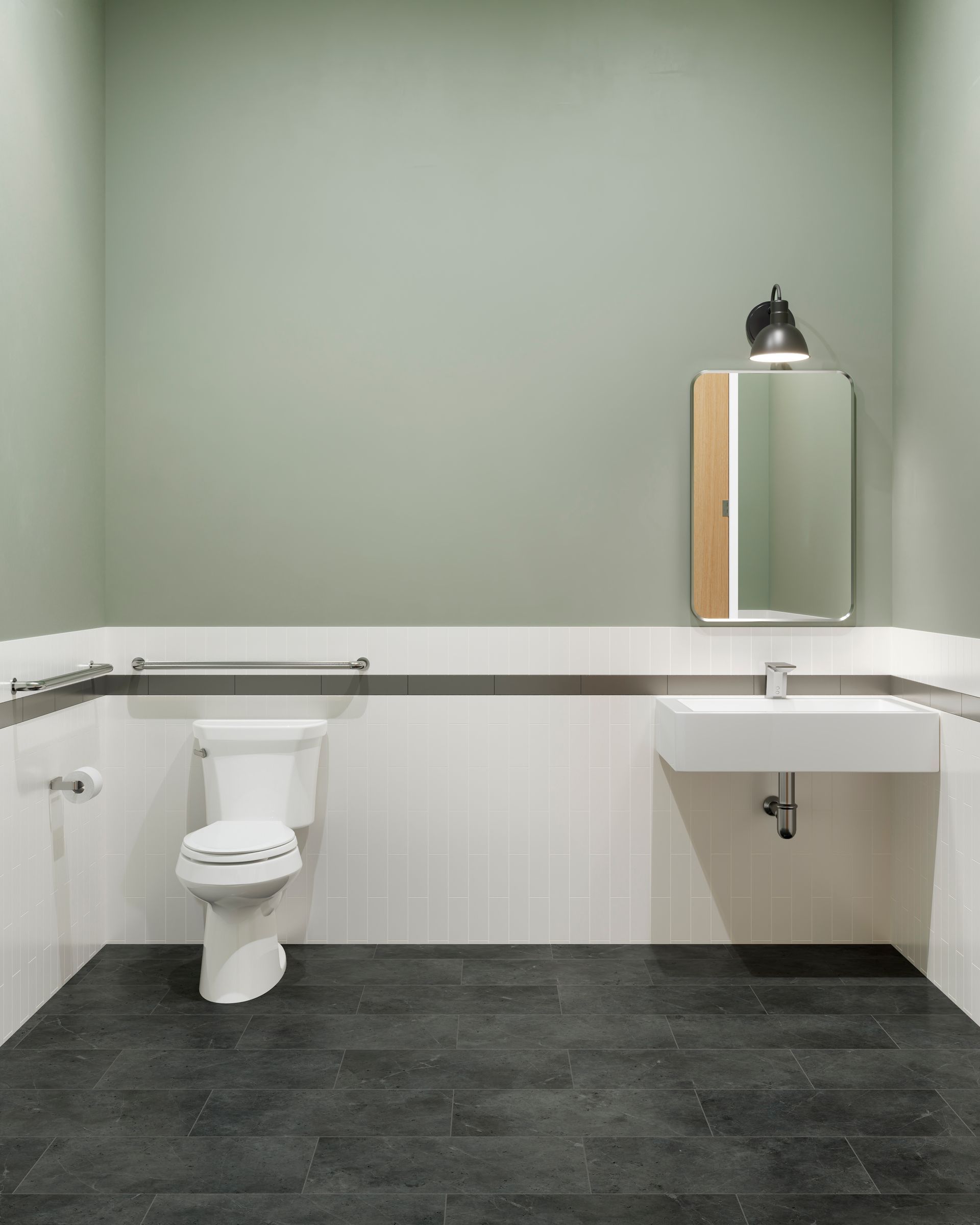 A bathroom with a toilet , sink and mirror