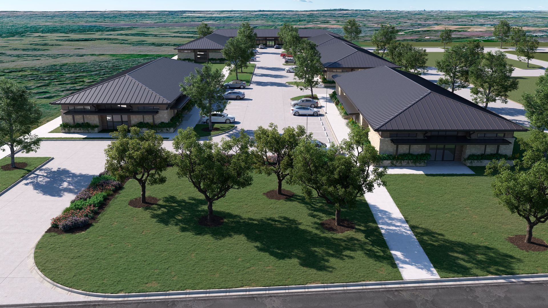 An aerial view of a large building with a lot of trees