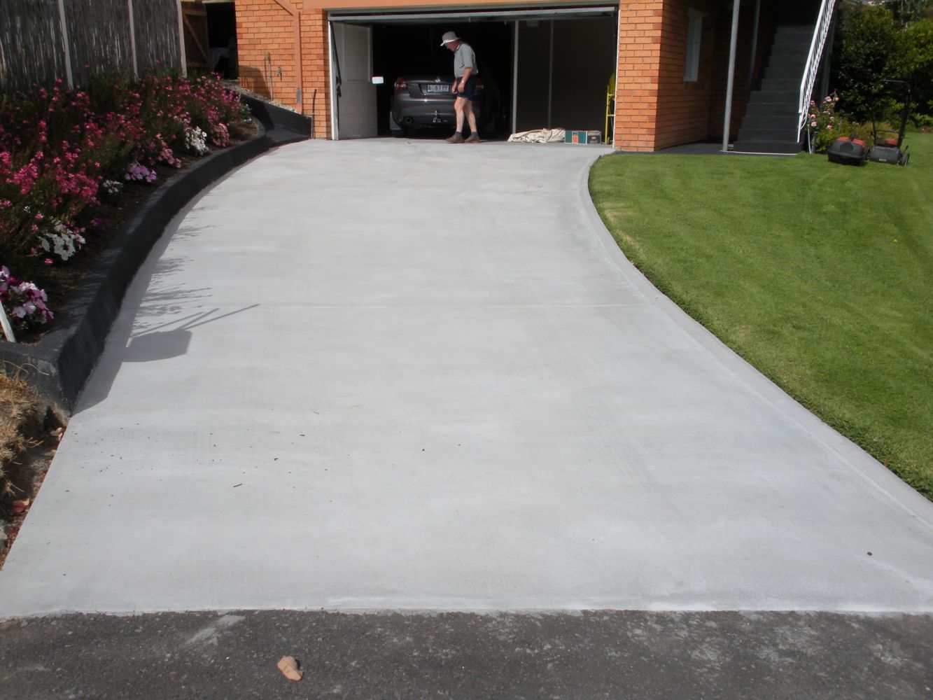 Before Plain Garage Way Resurfacing — Tasmania — Concrete Concepts Tasmania Pty Ltd