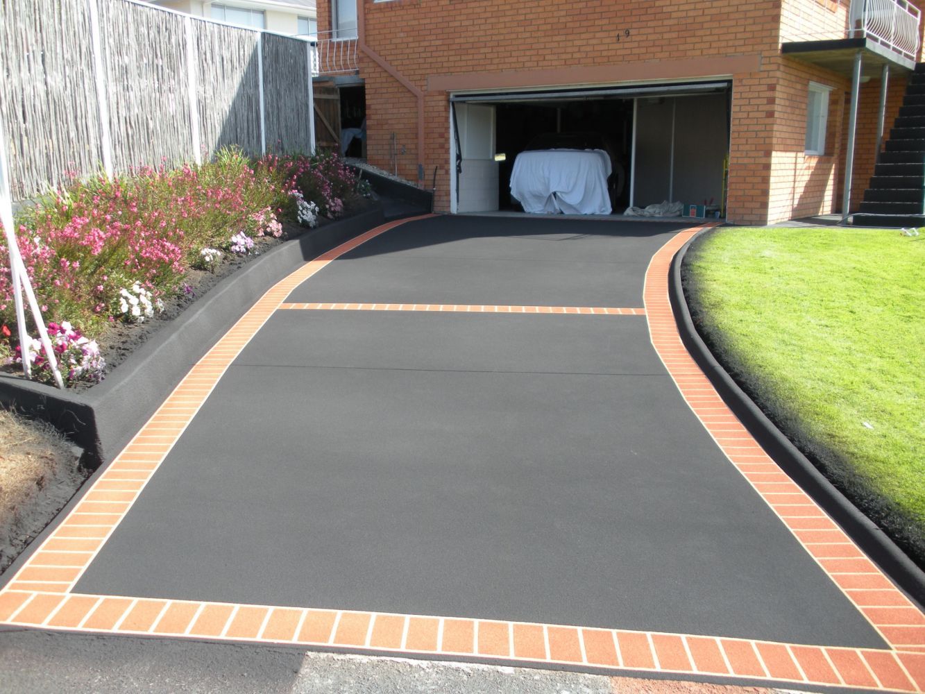 After Plain Garage Way Resurfacing — Tasmania — Concrete Concepts Tasmania Pty Ltd