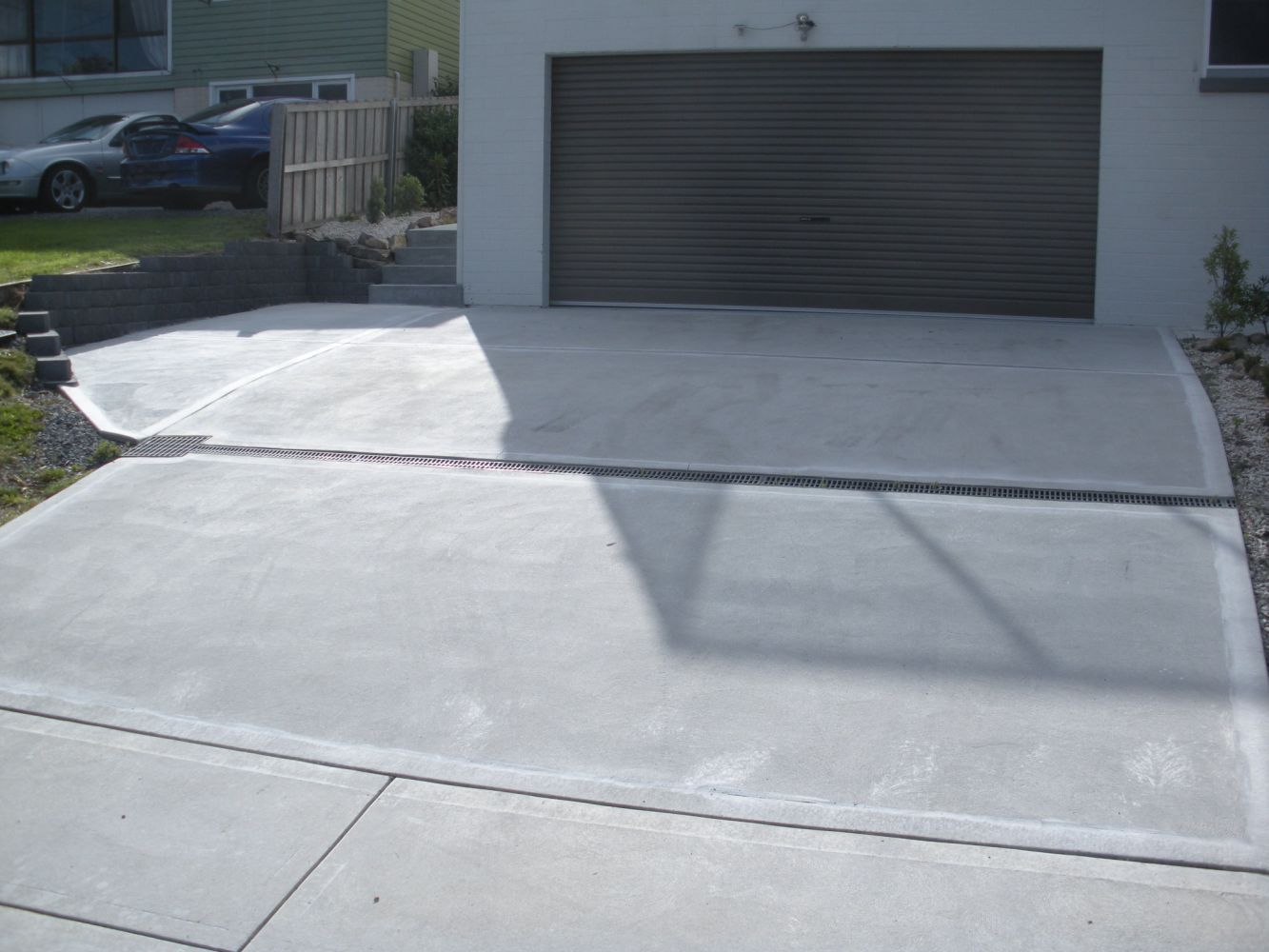 After Surfacing Old Garage Pathway — Tasmania — Concrete Concepts Tasmania Pty Ltd