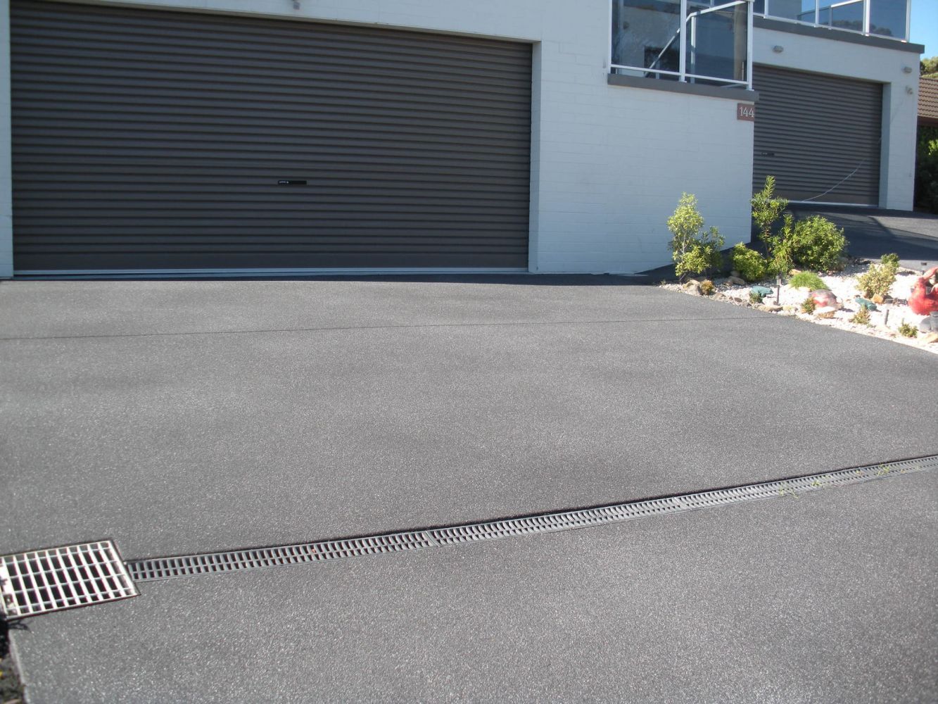 Garage Concrete Path with Drainage — Tasmania — Concrete Concepts Tasmania Pty Ltd