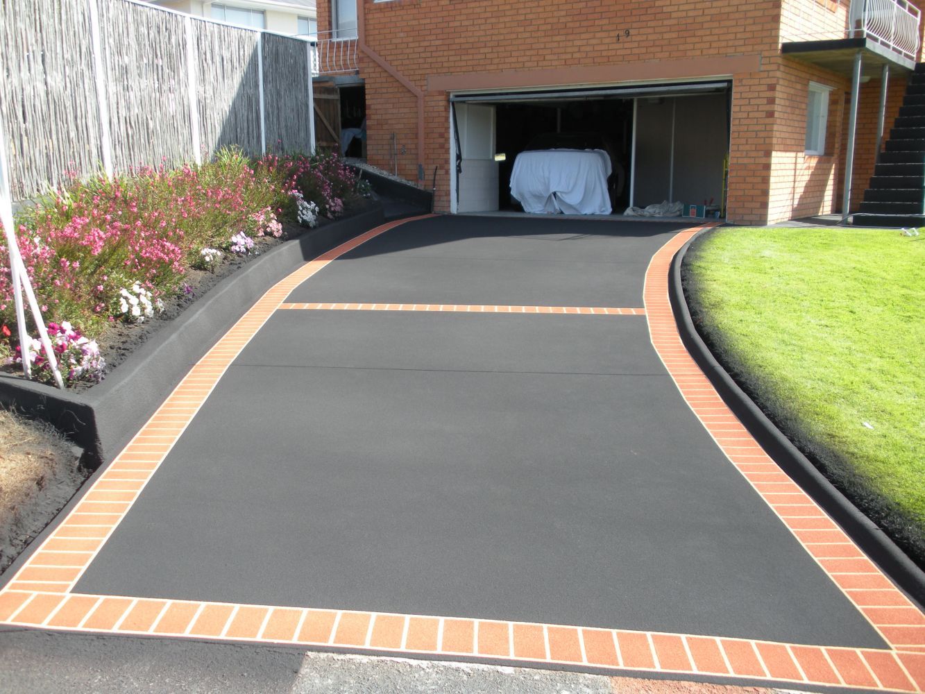 After Plain Garage Way Resurfacing — Tasmania — Concrete Concepts Tasmania Pty Ltd