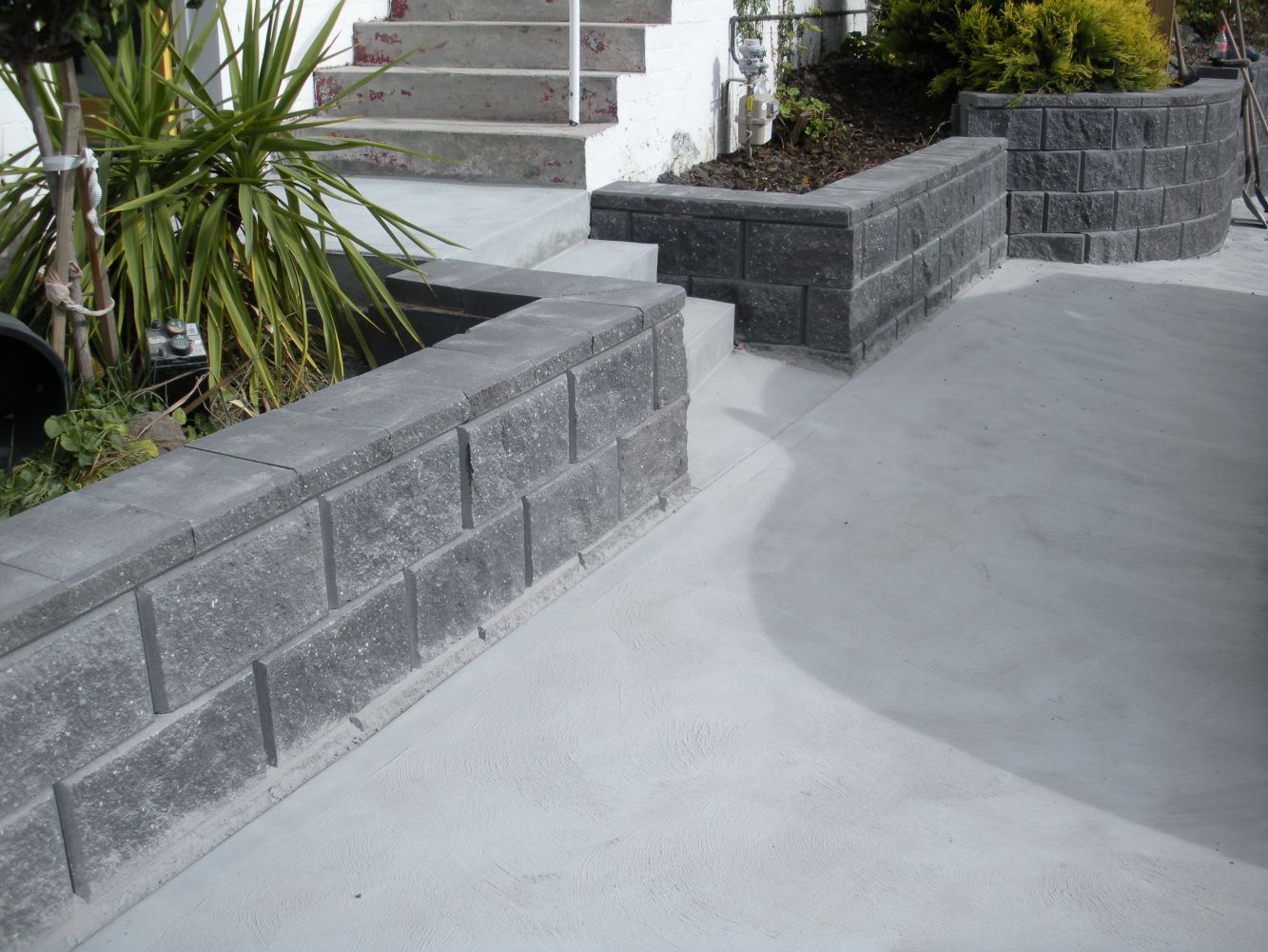 Retaining Wall with Plants — Tasmania — Concrete Concepts Tasmania Pty Ltd