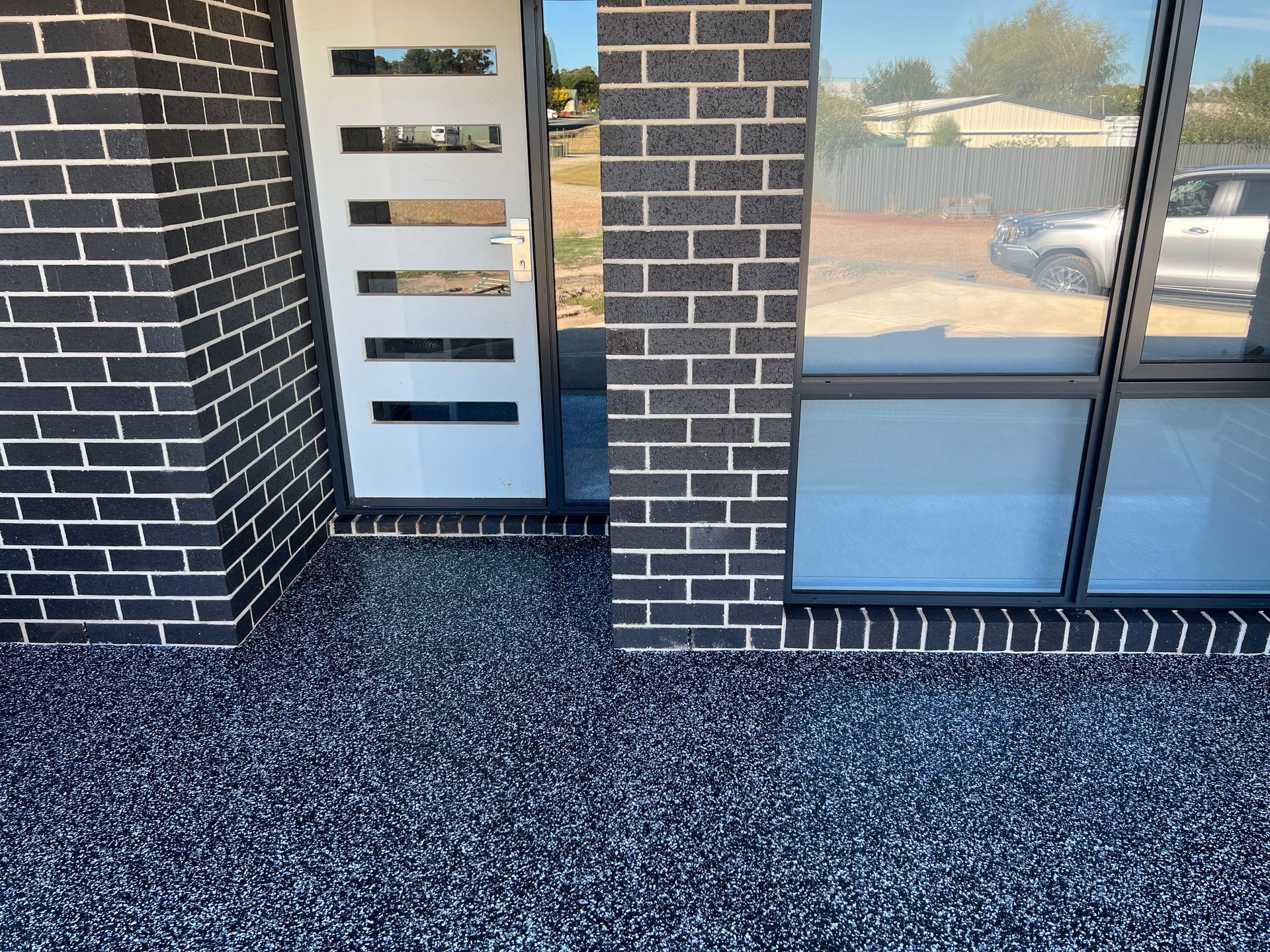 House with concrete wall — Tasmania — Concrete Concepts Tasmania Pty Ltd