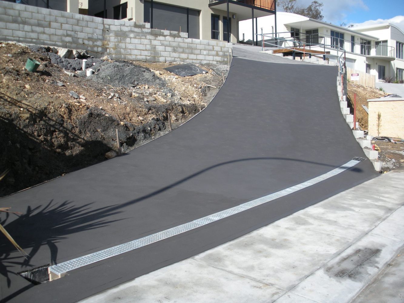 Uphill Concrete Floor — Tasmania — Concrete Concepts Tasmania Pty Ltd