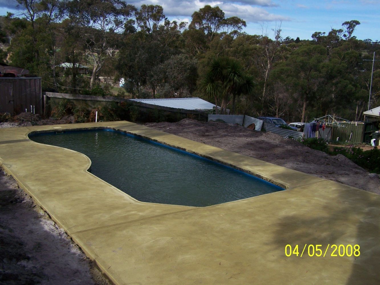 Coloured Concrete Pool Flooring — Tasmania — Concrete Concepts Tasmania Pty Ltd