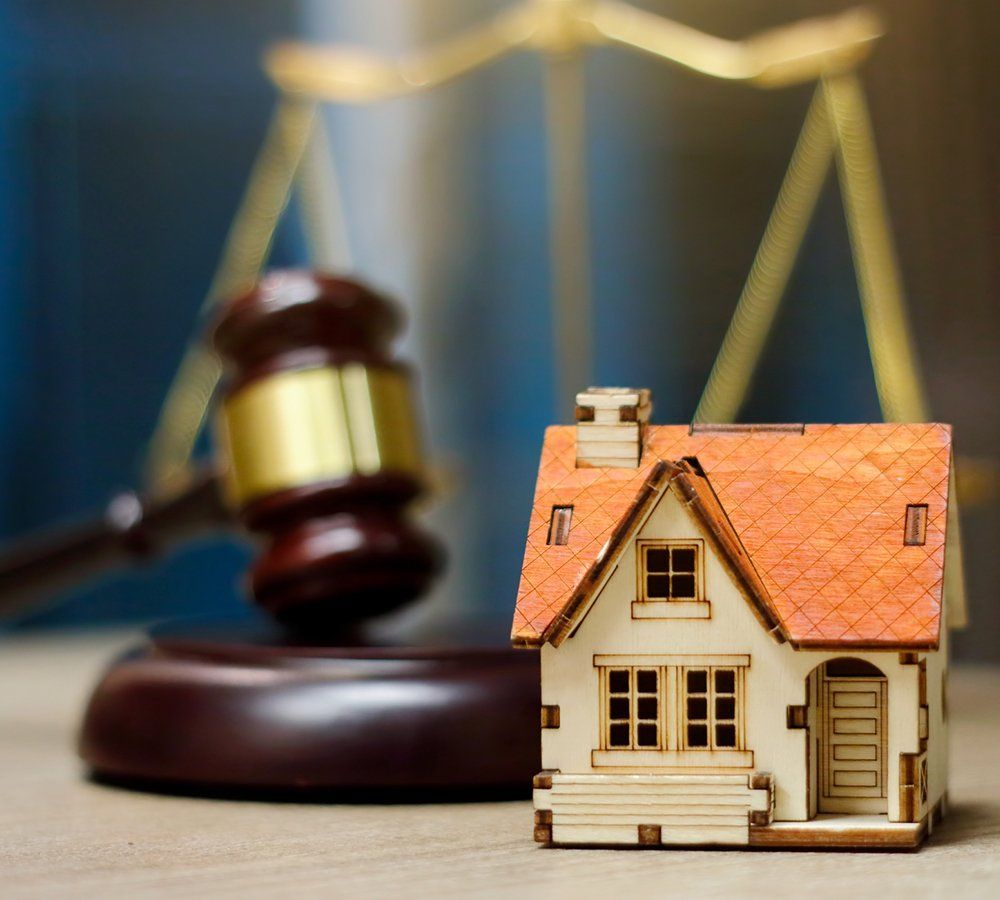 Judge Gavel and House Model on Table — Sanford, NC — Stephenson & Stephenson PA Attorneys at Law