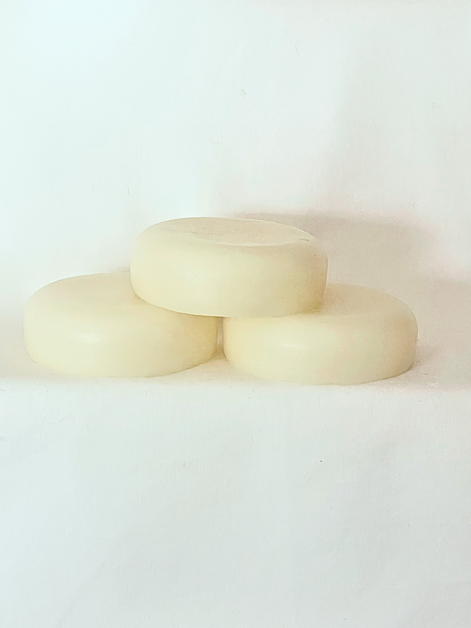 These high quality conditioning bars are made with nourishing butters and oils. The added vitamin B and Vitamin E leaves your hair and scalp feeling soft and hydrated. Because these bars contain no water, they are extremely long lasting and cost effective. Decrease your carbon footprint, decreasing the use of plastic bottles. These bars are a perfect compliment to our shampoo bars and can be made in any soap scent you request.
