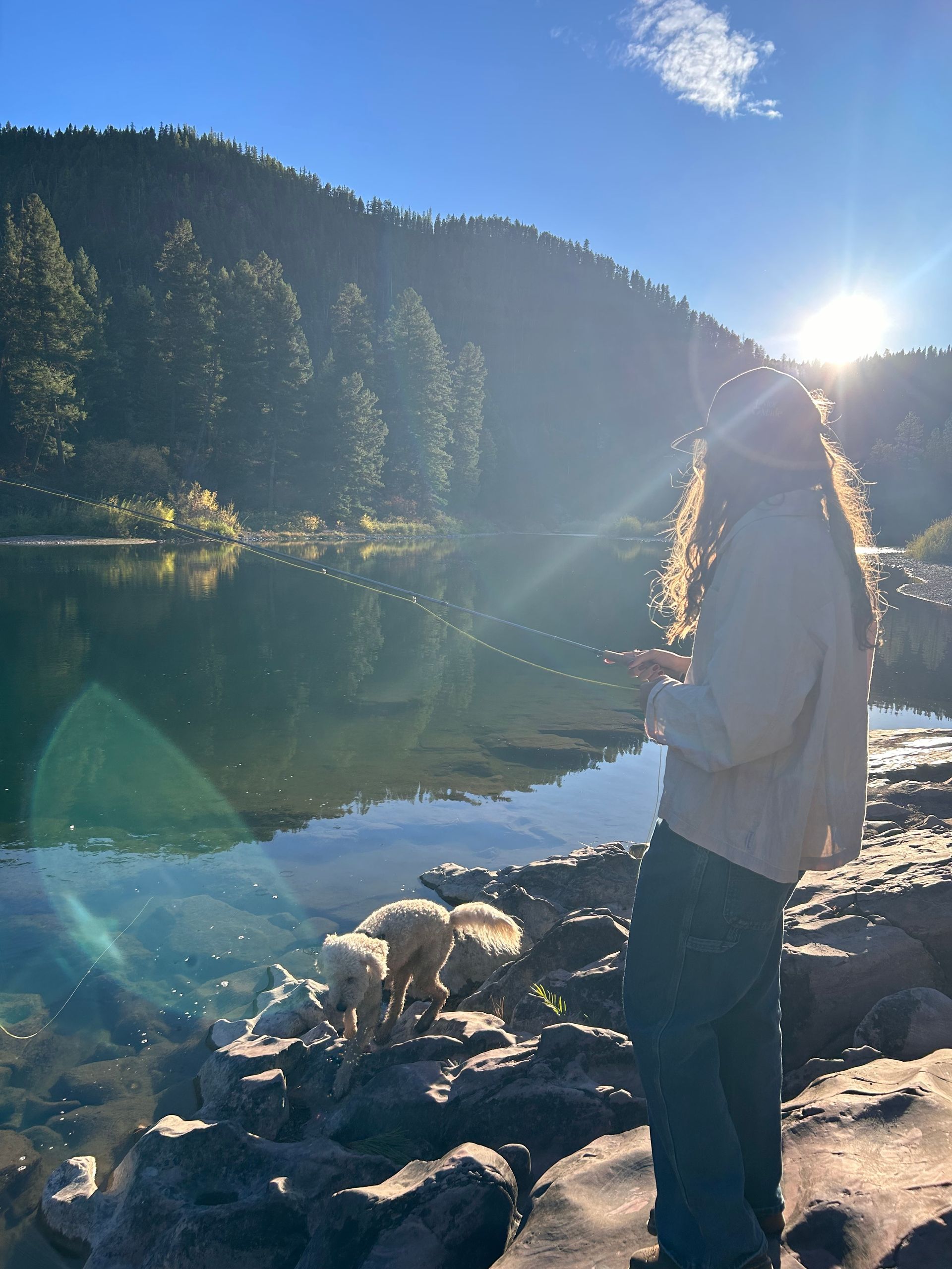 Girl getting a piggy back ride at sunset.