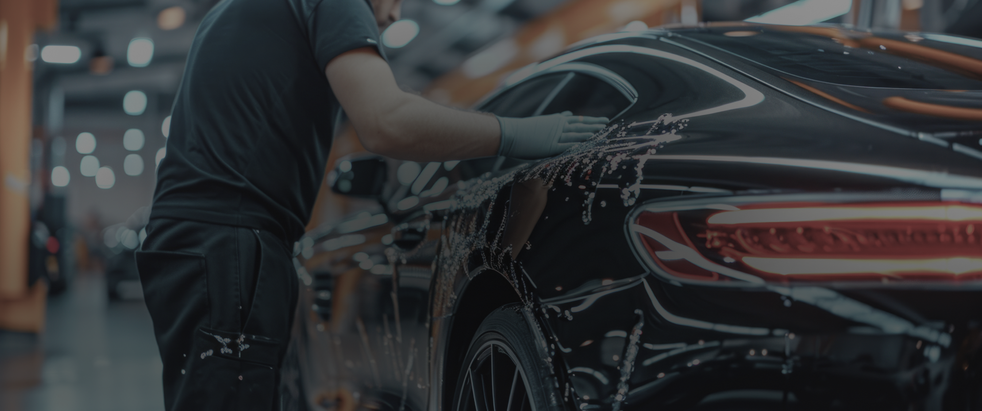 Person detailing a car