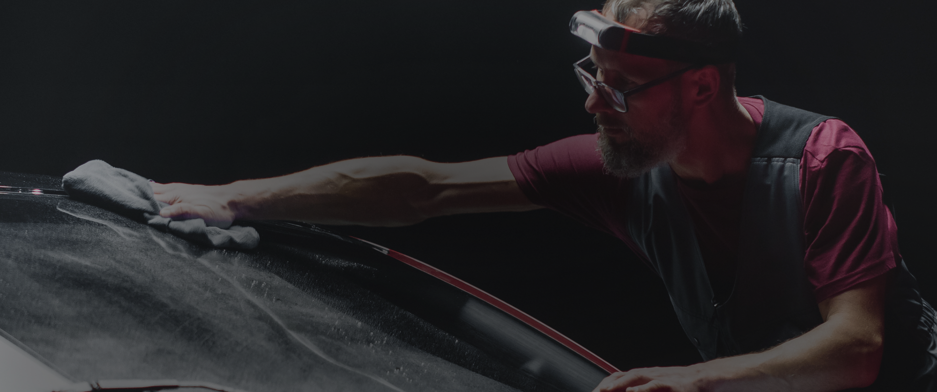 Person detailing a car 