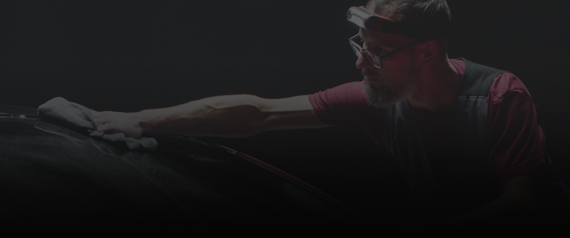 Mechanic working on a car | Impeccable Detail