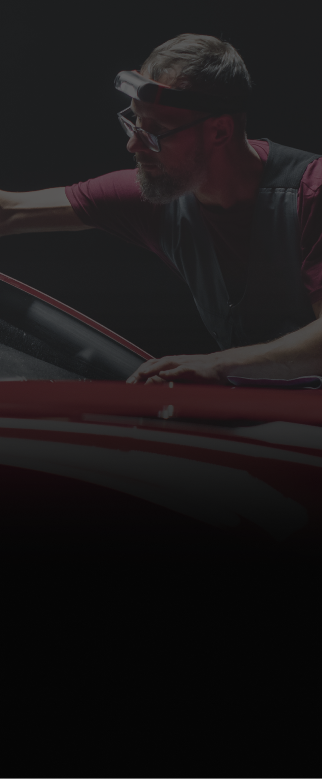 Mechanic working on a car | Impeccable Detail