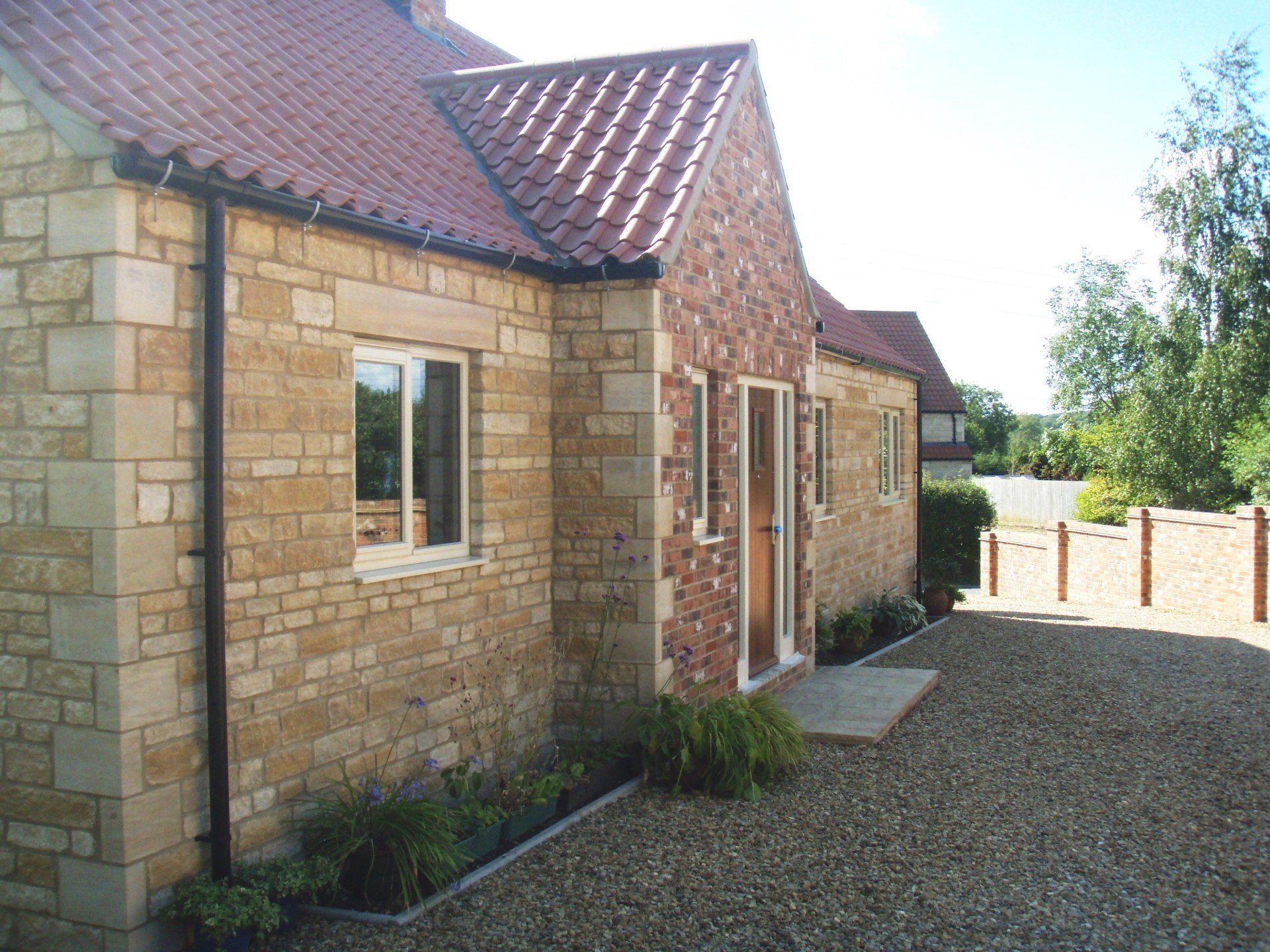 Stone Chalet Bungalow With Pantile Roof