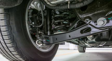 A Car With a Tire and Absorber — Maroochy Automotive in Kunda Park, QLD