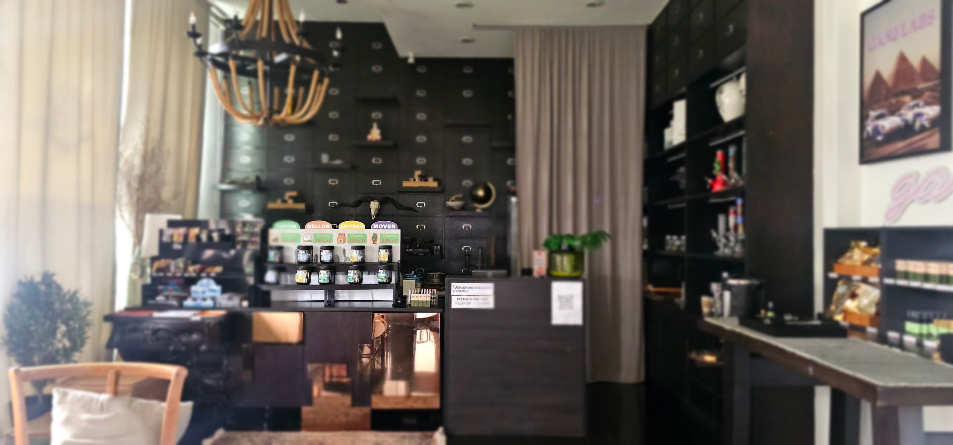 A room with a table and chairs in it and a counter.