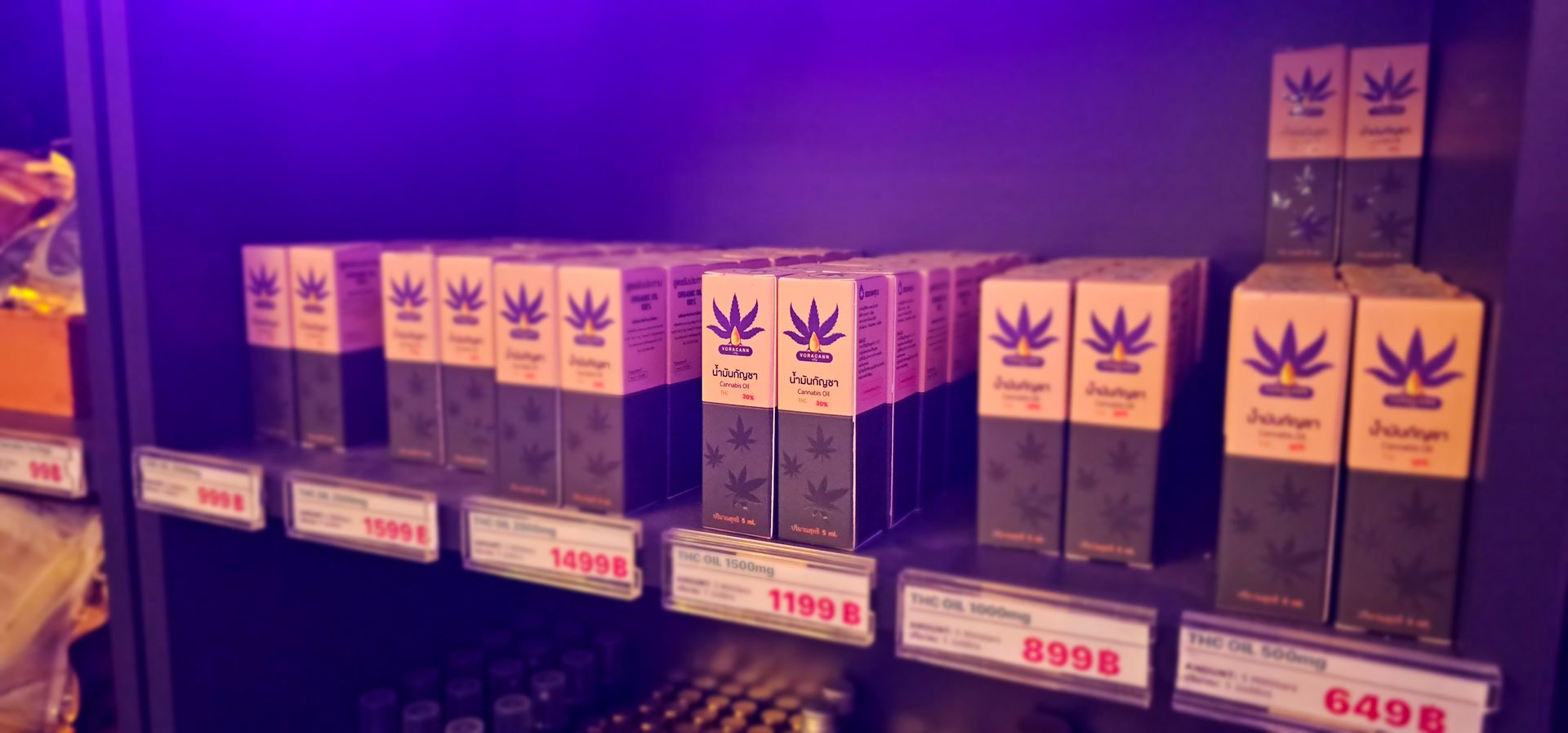A shelf filled with lots of boxes of the best supplements from weed cannabi
