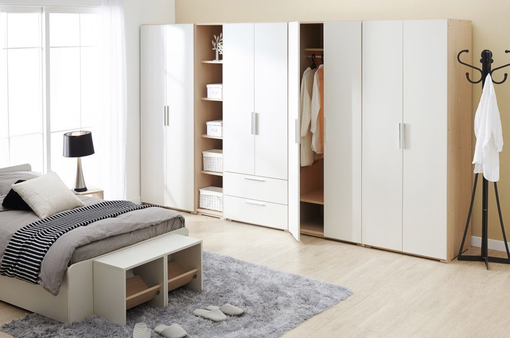 A Bedroom With A Bed, Wardrobes And A Bench — InStyle Shower Screens & Wardrobes in Newcastle, NSW