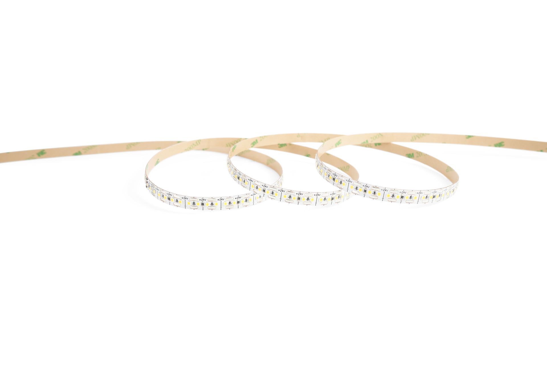 Flexible LED light strip, white LEDs on a roll with adhesive backing.