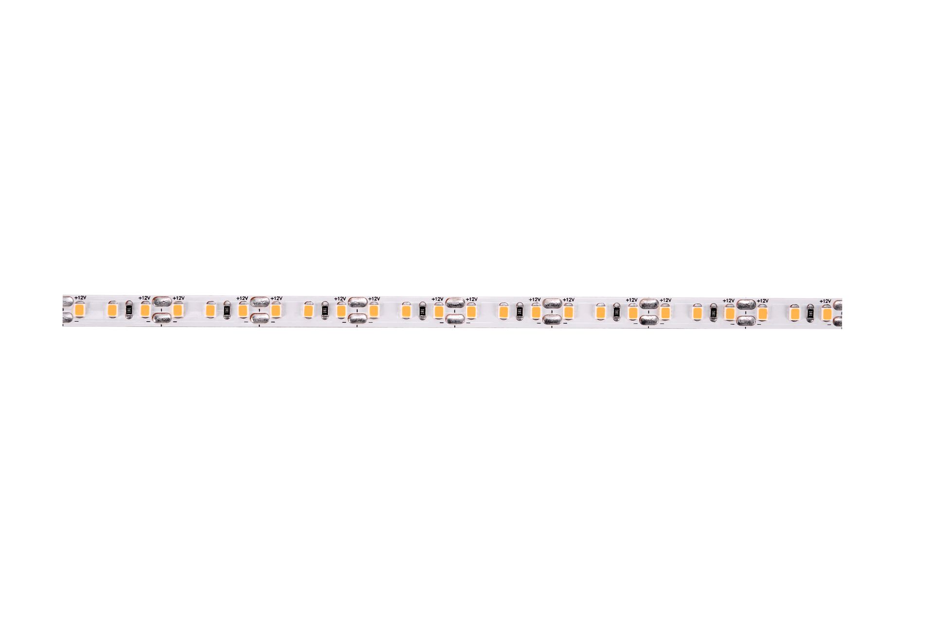 LED light strip coiled on a white surface, with adhesive backing exposed.