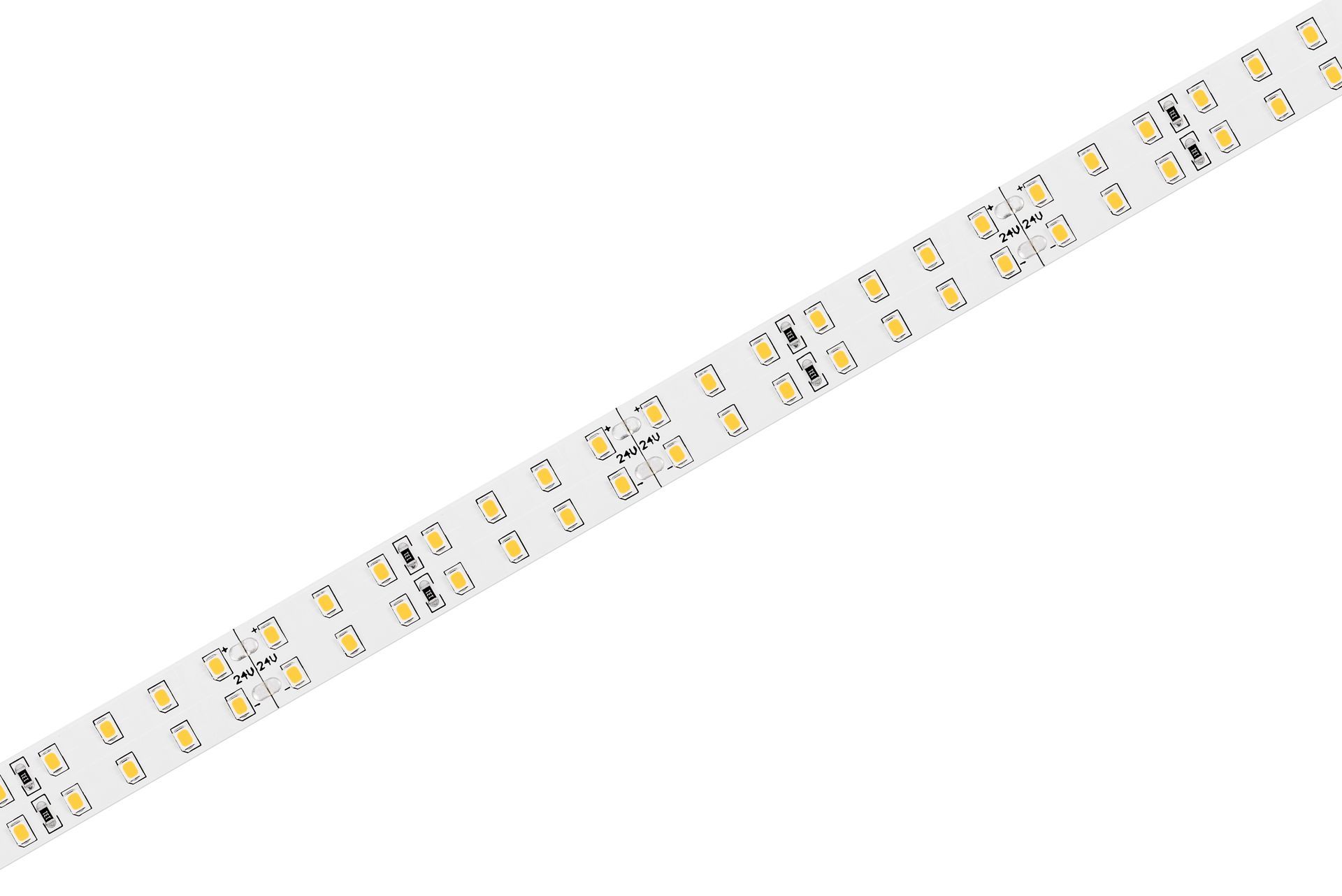 LED strip lights coiled on a white surface, red and black wires extend from one end.
