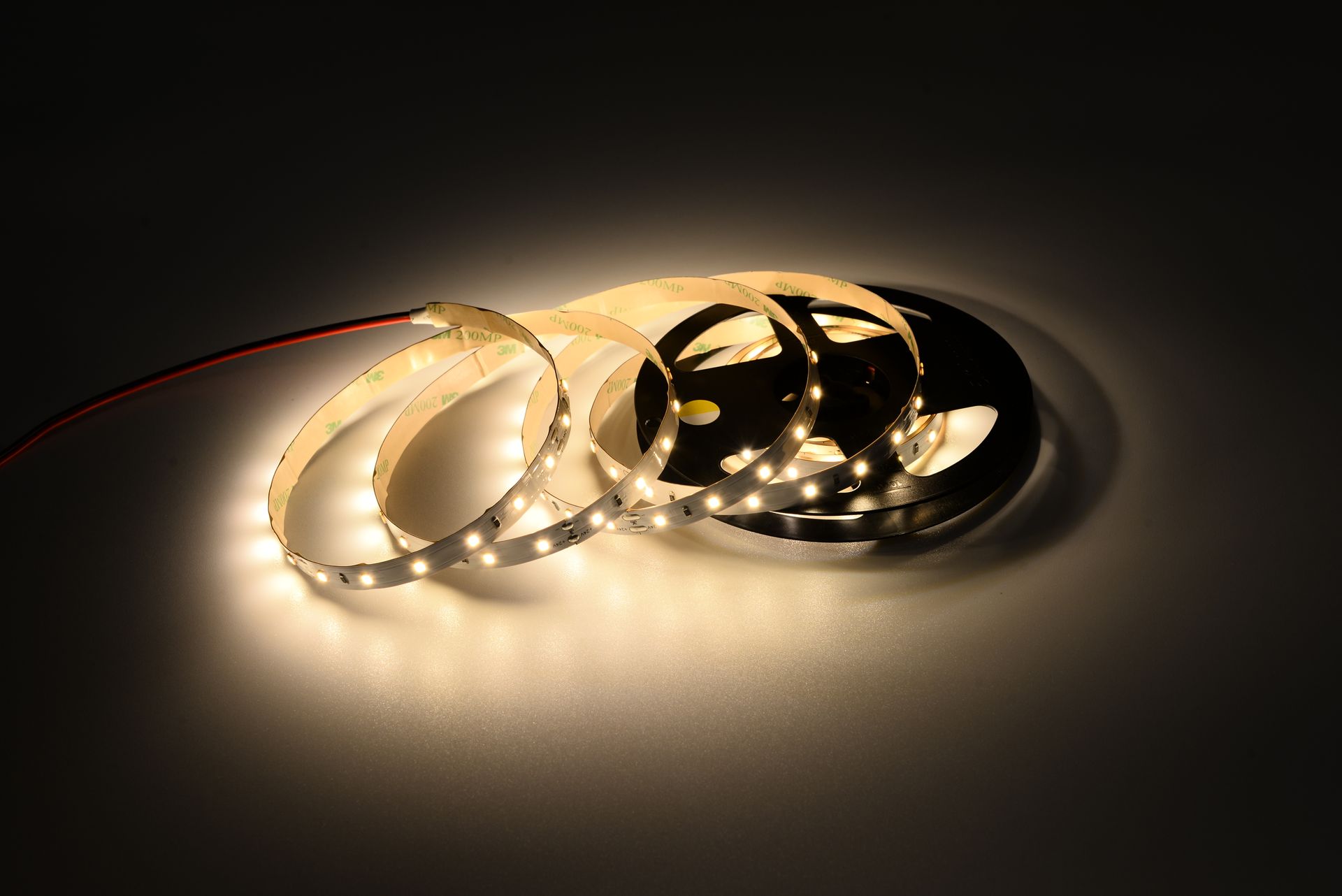LED Strip Lights rolled up on a white background