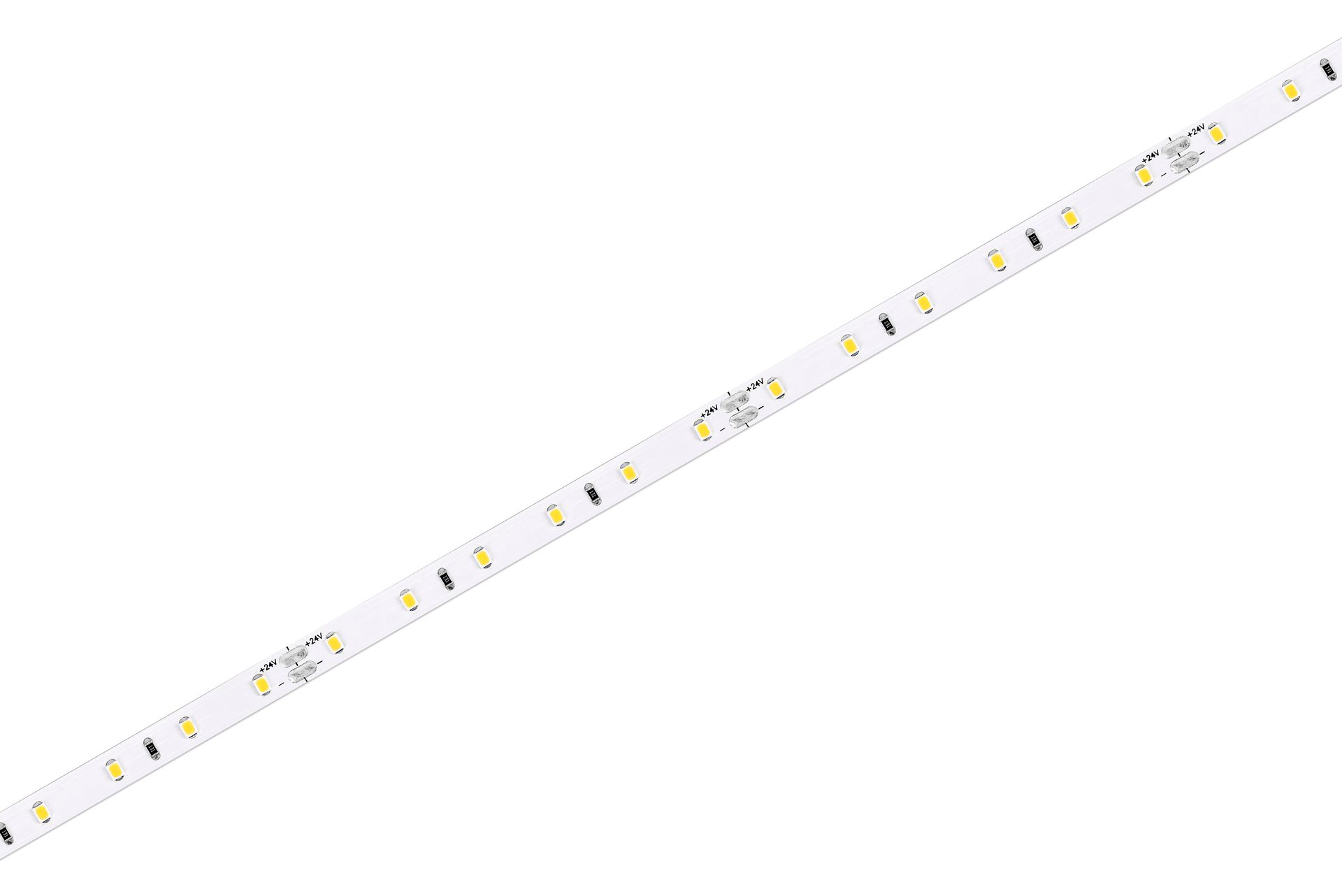 LED strip light coiled on a white surface, revealing the LEDs and adhesive backing.