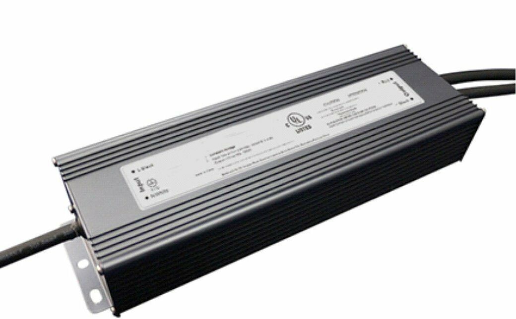 A rectangular, grey LED driver with cooling fins, connected to two black wires, with a product label in the center.