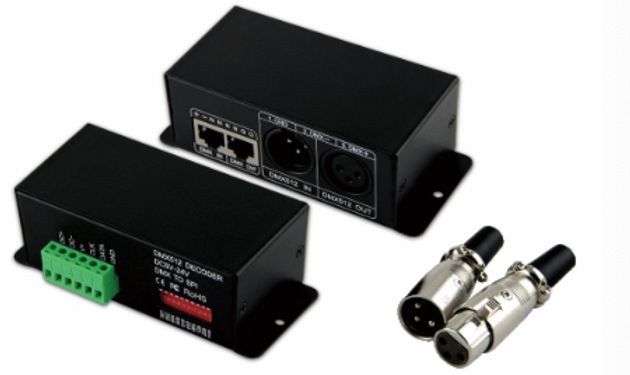 Two black DMX-Ethernet converters with connectors and a terminal block.