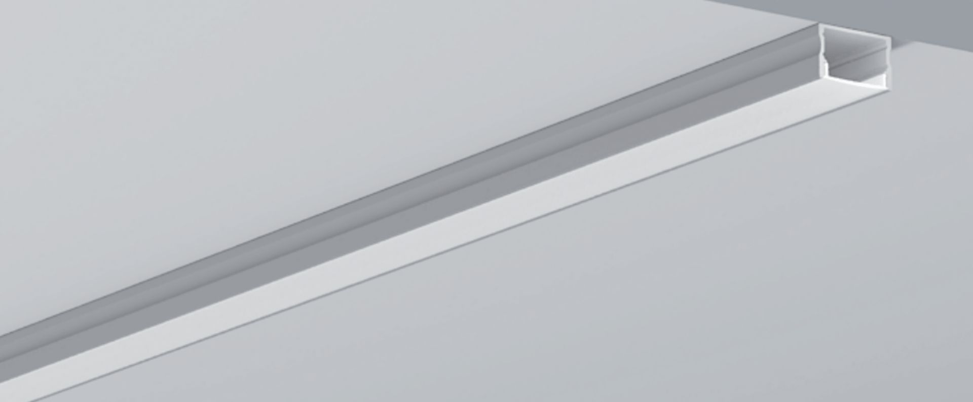 A white rectangular ceiling light fixture mounted on a light gray ceiling.