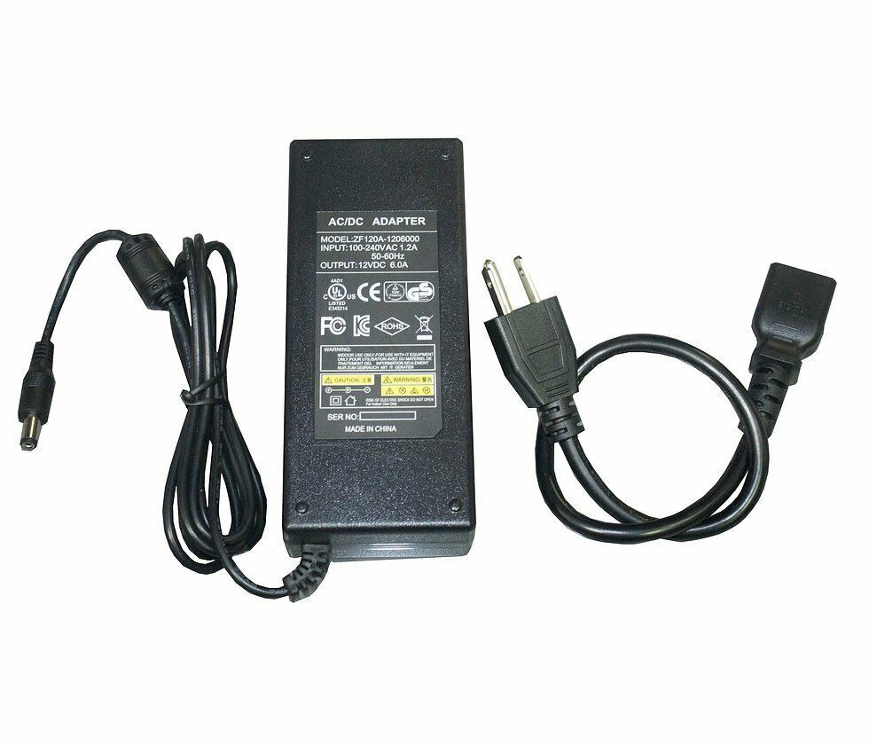 Black power adapter with cords and plugs.