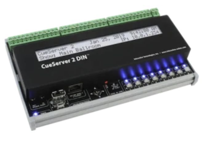 Black CueServer 2 DIN lighting controller with LCD screen, terminal blocks, LEDs, and network ports.