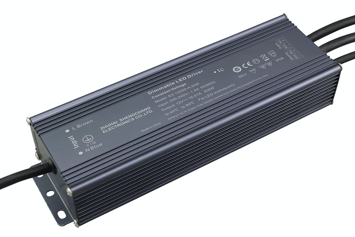 Dark gray LED power supply with three black wires extending from the right side and mounting brackets on the bottom left.