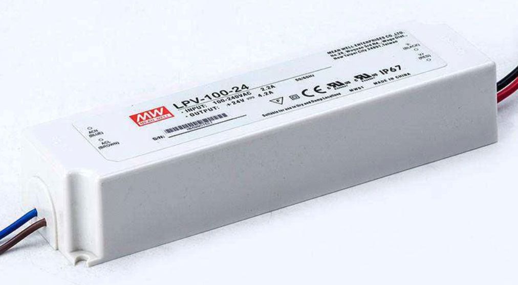 White LED power supply with colored wires attached, showing product label.