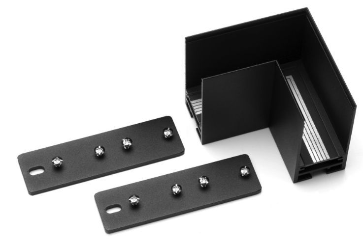 Black corner LED light fixture components and mounting plates.