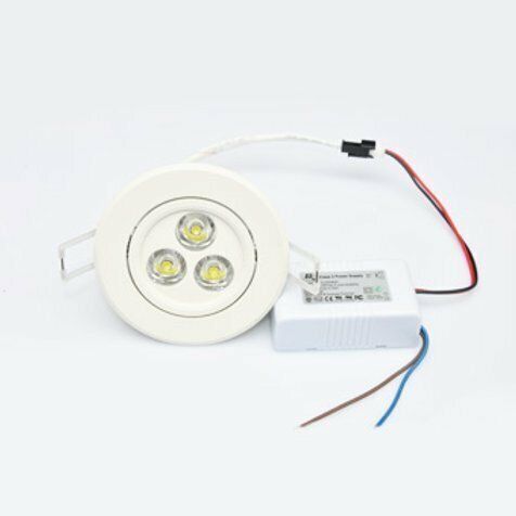 White recessed LED spotlight with driver box and wiring.