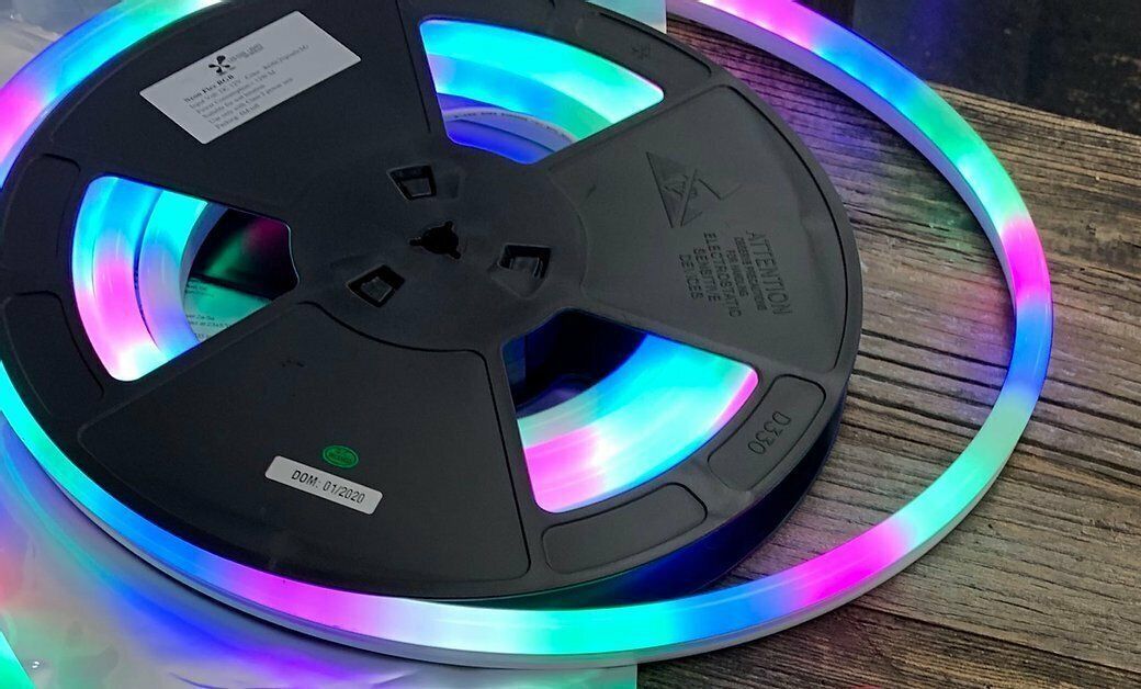 Roll of Neon Flex Tape emitting rainbow colors.